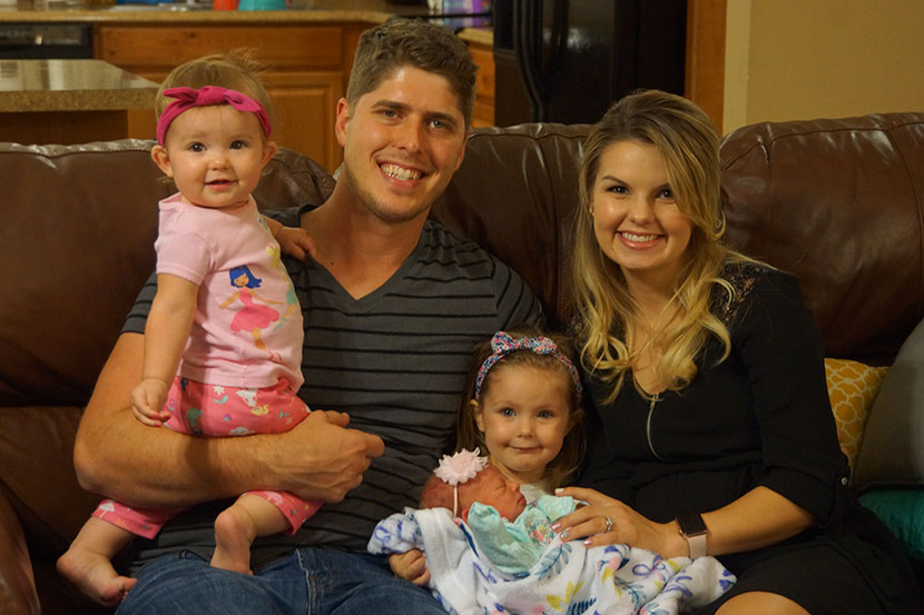 John and Alyssa Webster with their three daughters.